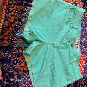 Neon green jean shorts